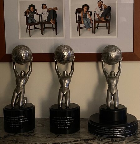 three statue awards